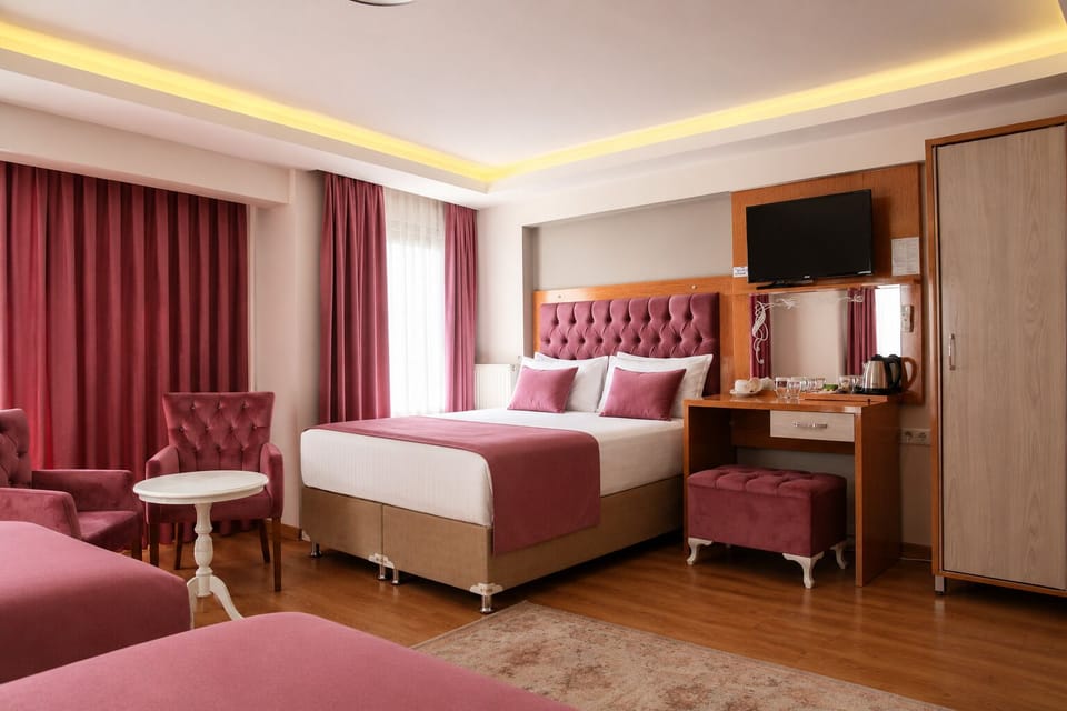 Family Room | Minibar, in-room safe, soundproofing, WiFi (free)