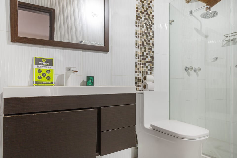 Shower, rainfall showerhead, designer toiletries, towels