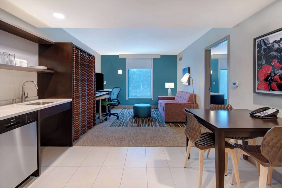 Suite, 1 Bedroom | Desk, iron/ironing board, free WiFi, bed sheets