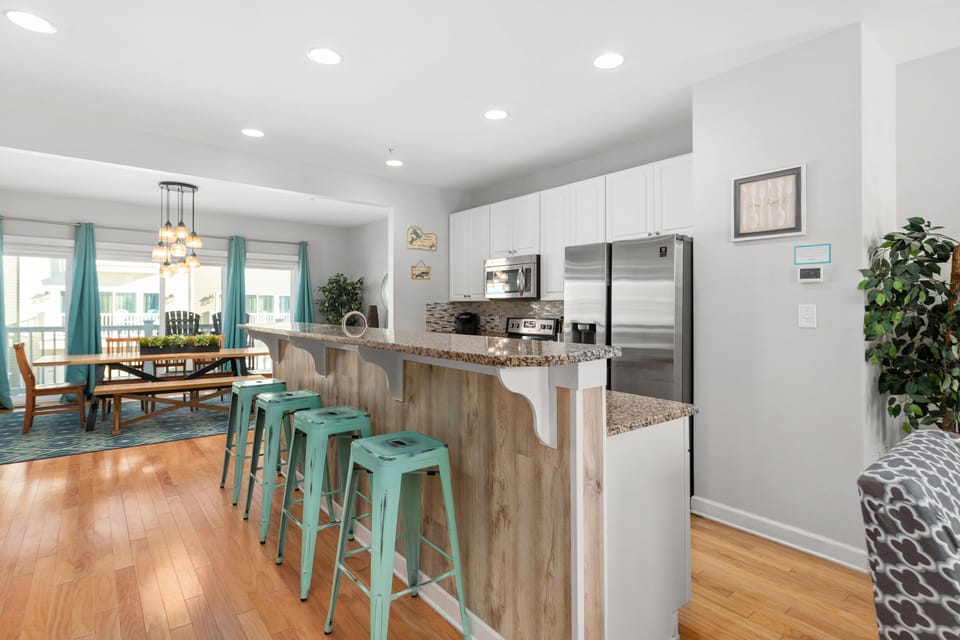 Open floor plan concept connecting Living room/kitchen/dining area for entertain