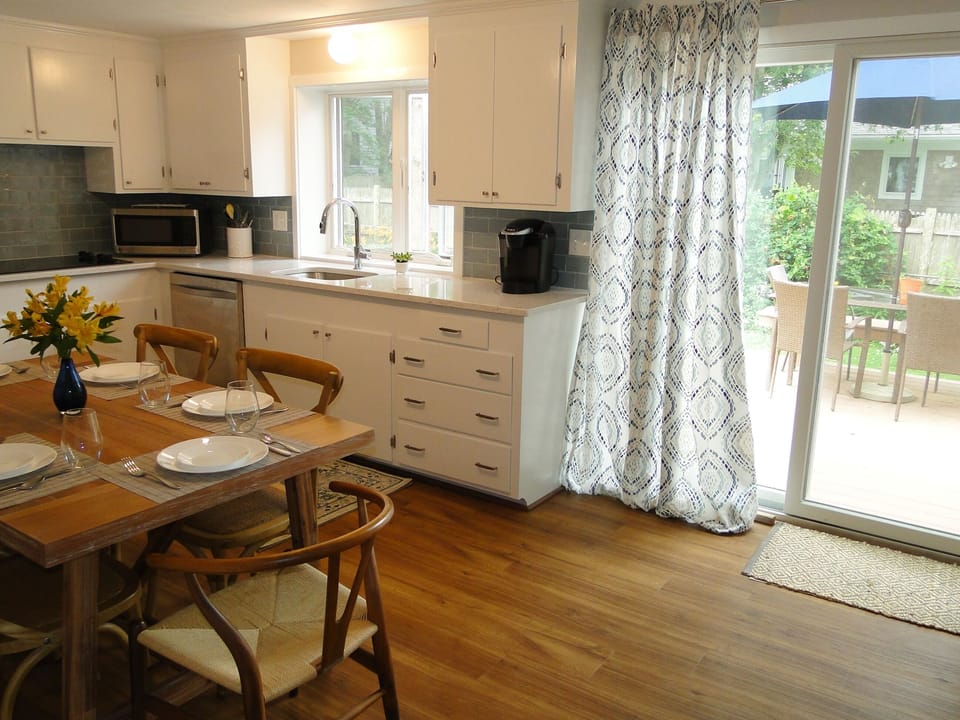 Renovated kitchen opens directly to deck