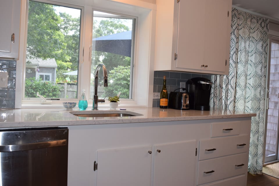 Kitchen window overlooking the backyard