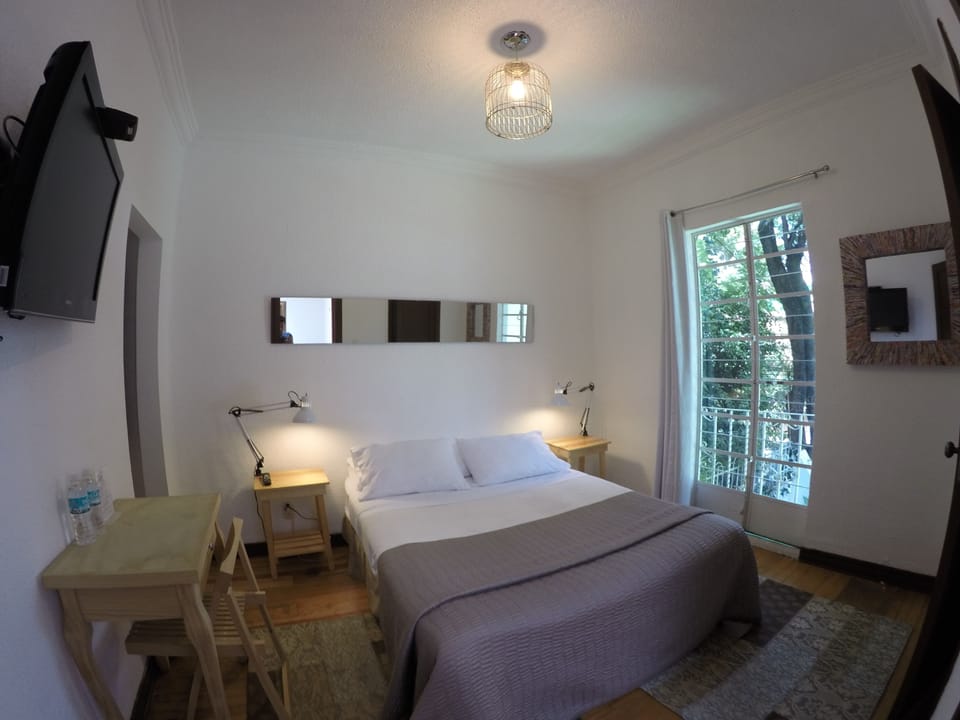 Standard Room, 1 Queen Bed, Balcony (C2) | In-room safe, individually decorated, individually furnished, desk