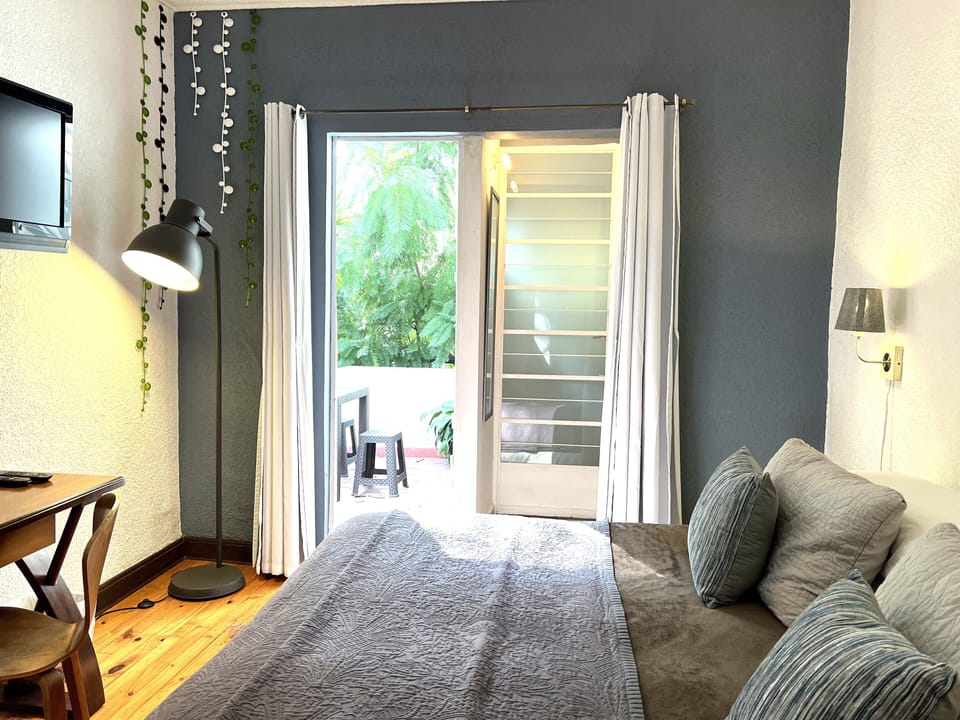Deluxe Room, 1 King Bed, Terrace (C1) | In-room safe, individually decorated, individually furnished, desk