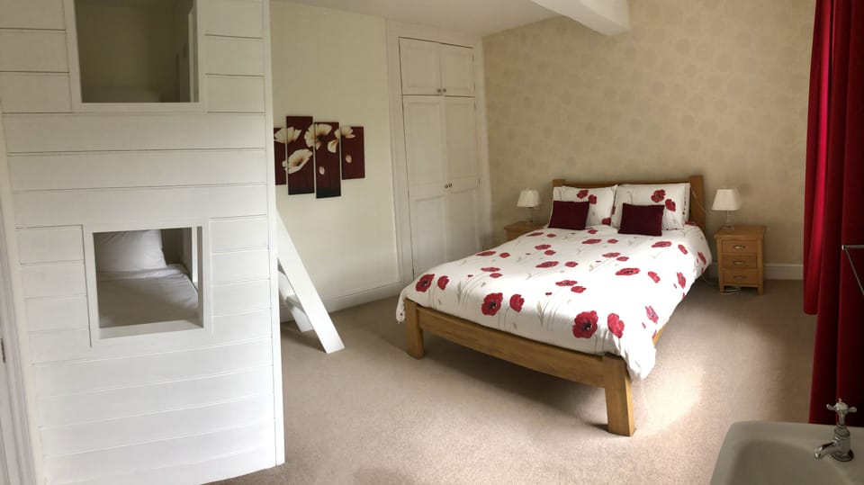 Family room with kingsize double and bespoke adult bunk beds