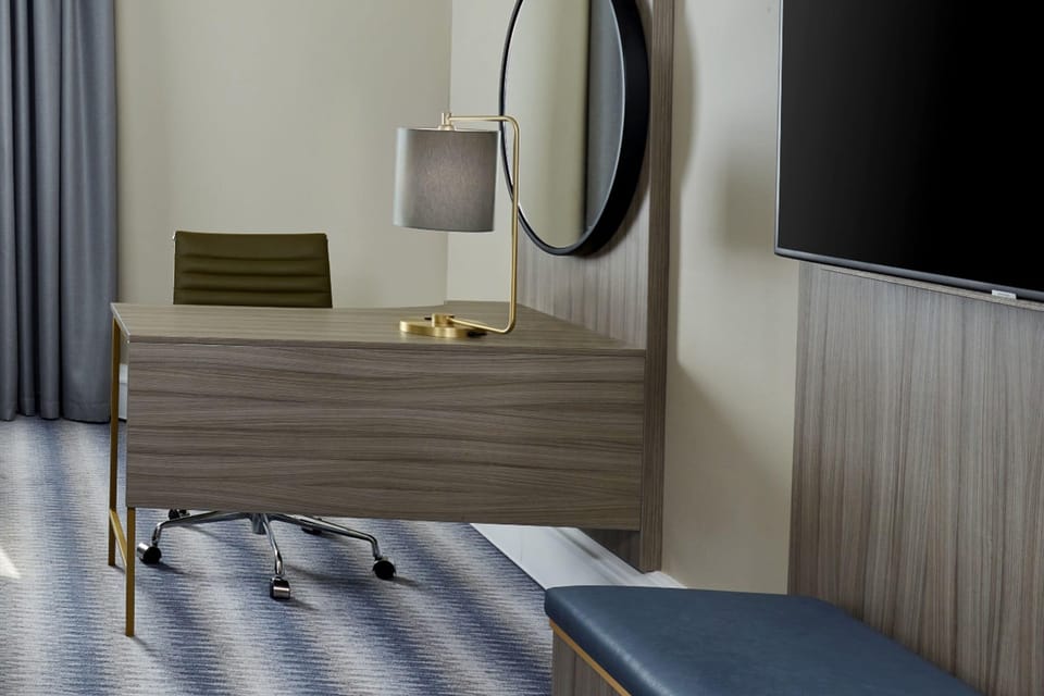 Hypo-allergenic bedding available, in-room safe, desk, laptop workspace