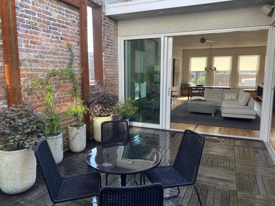 Private indoor patio with access to living room, master bedroom, and hallway