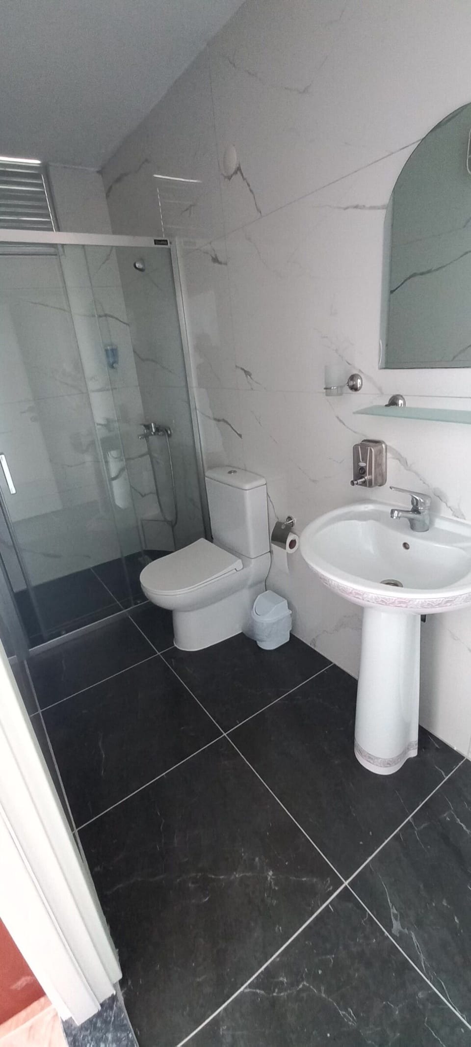 Shower, free toiletries, hair dryer, slippers