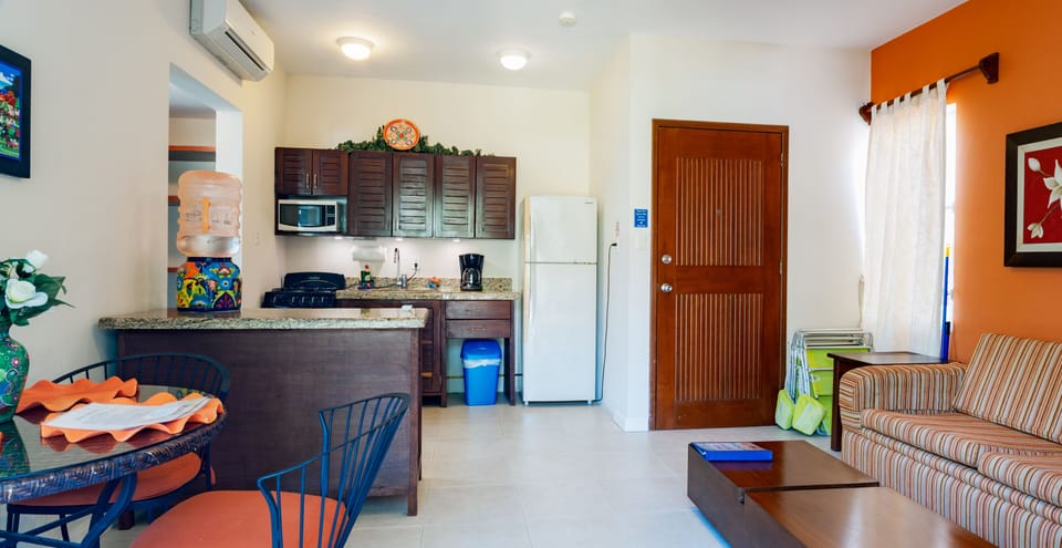 Living room - Living room area with a open kitchen. Beach chairs available to take with you to the beach.