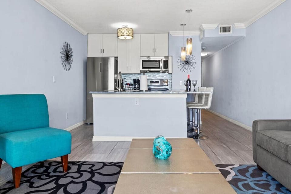 Living Room: Sunshine-filled space with chic decor and modern seating, perfect for relaxation!