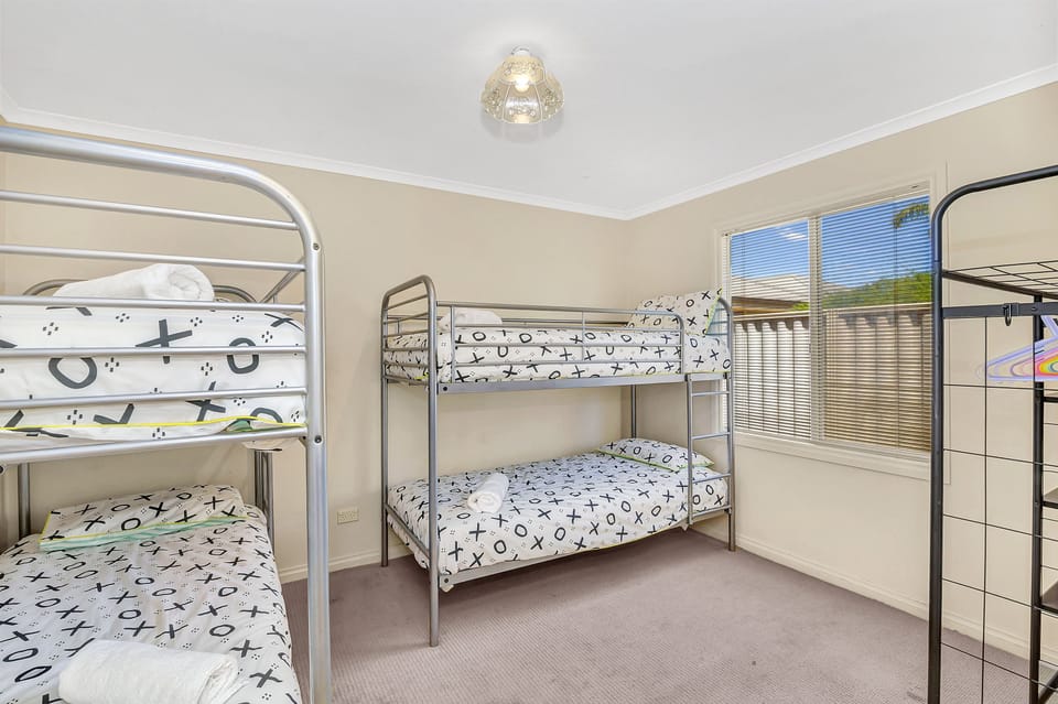 Green Reef Beach House | 4 bedrooms, soundproofing, iron/ironing board, bed sheets