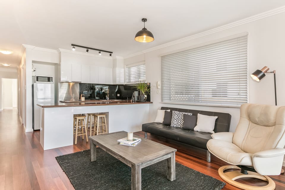 Apartment, 3 Bedrooms, Ocean View, Beachfront | Living area | Flat-screen TV