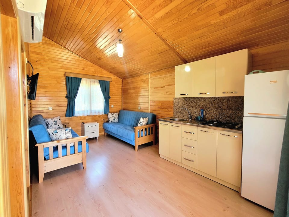 Superior Bungalow, 1 Bedroom, Kitchenette, Garden Area | Private kitchenette | Fridge