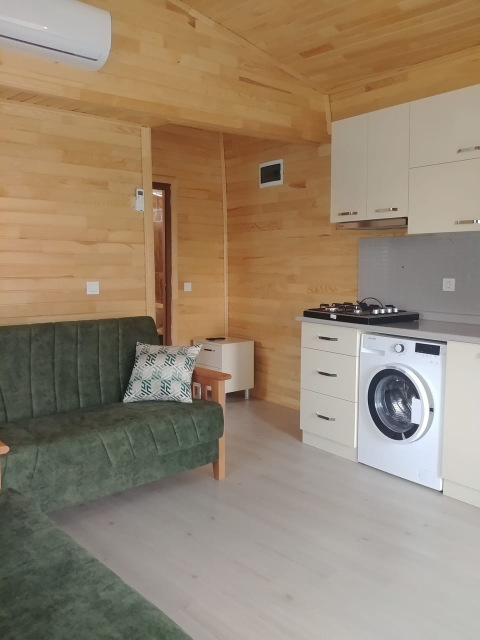 Premium Bungalow, 1 Bedroom, Kitchenette, Garden Area | Living area | Flat-screen TV, books