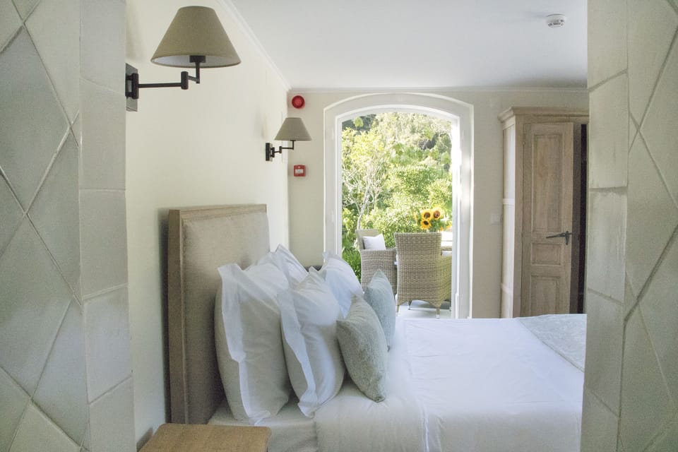 Double Room | Minibar, in-room safe, desk, blackout drapes