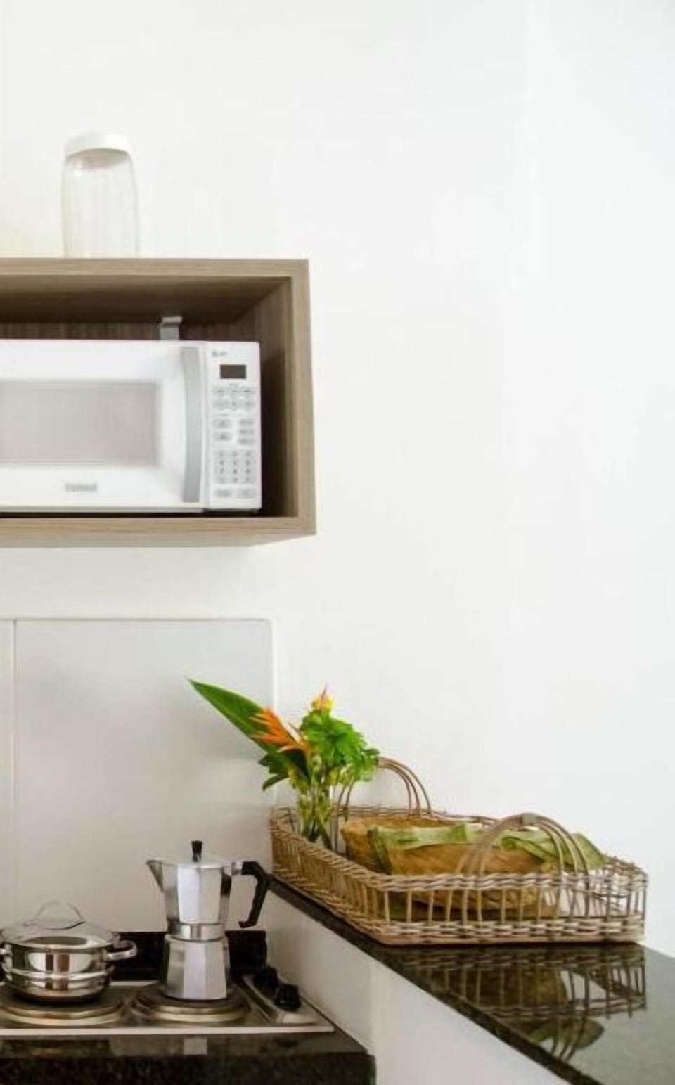 Fridge, microwave, stovetop, cookware/dishes/utensils