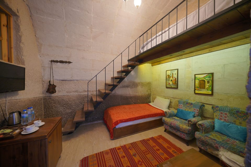 Family Suite, 2 Bedrooms (Cave) | Minibar, individually decorated, individually furnished, desk