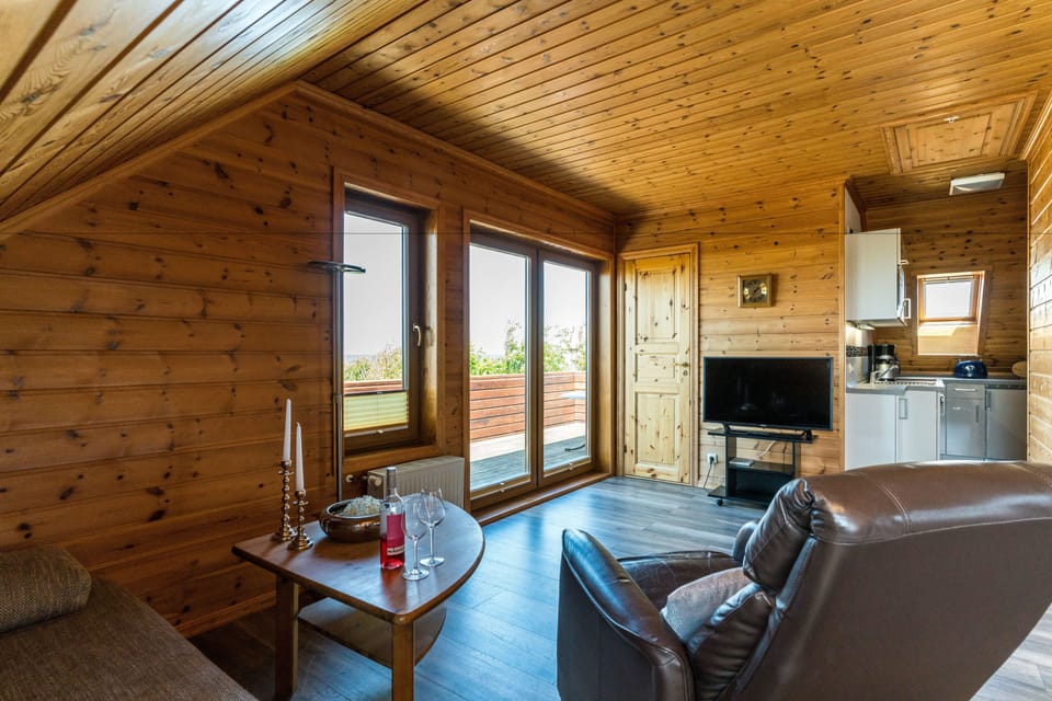Haus Windhook - Holiday Home Seeblick 1 | Living area | Flat-screen TV, pay movies