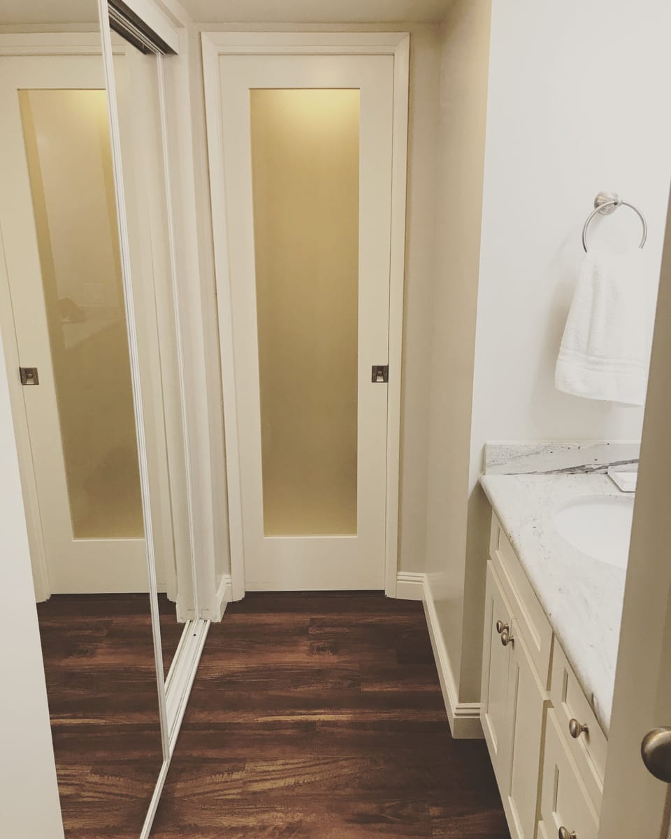 Closet and vanity area with plenty of storage space