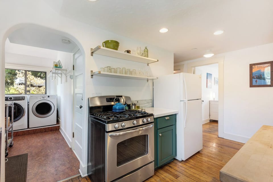 Kitchen has everything you need to cook including a 5 burner gas stove