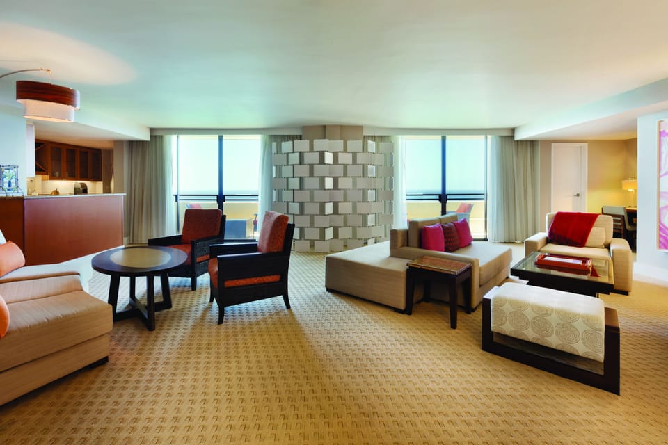 Penthouse (Suite) | Living room | 65-inch flat-screen TV with cable channels, TV