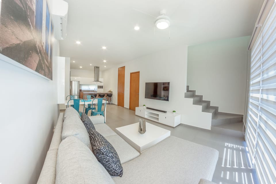 Chic Two Bedroom Penthouse | Living area | Flat-screen TV