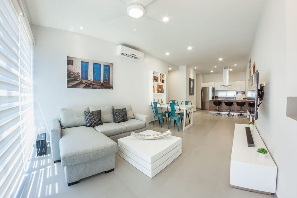 Chic Two Bedroom Penthouse | Living room | Flat-screen TV