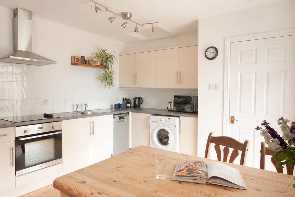 Generously sized and well-equipped kitchen including a full size fridge freezer