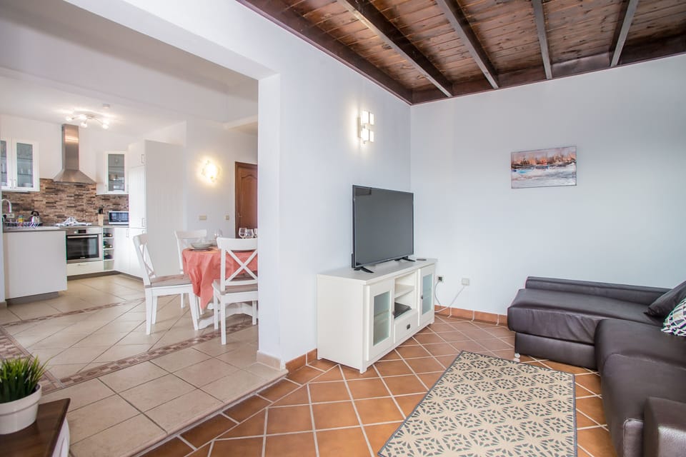Living room leading to kitchen & dining area