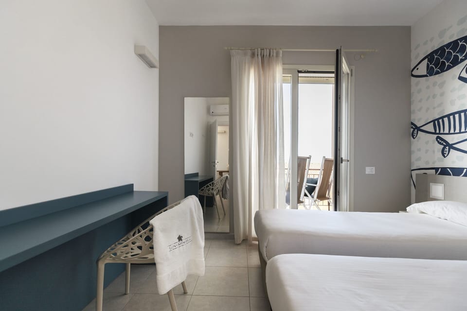Apartment, Sea View | Premium bedding, minibar, in-room safe, individually furnished