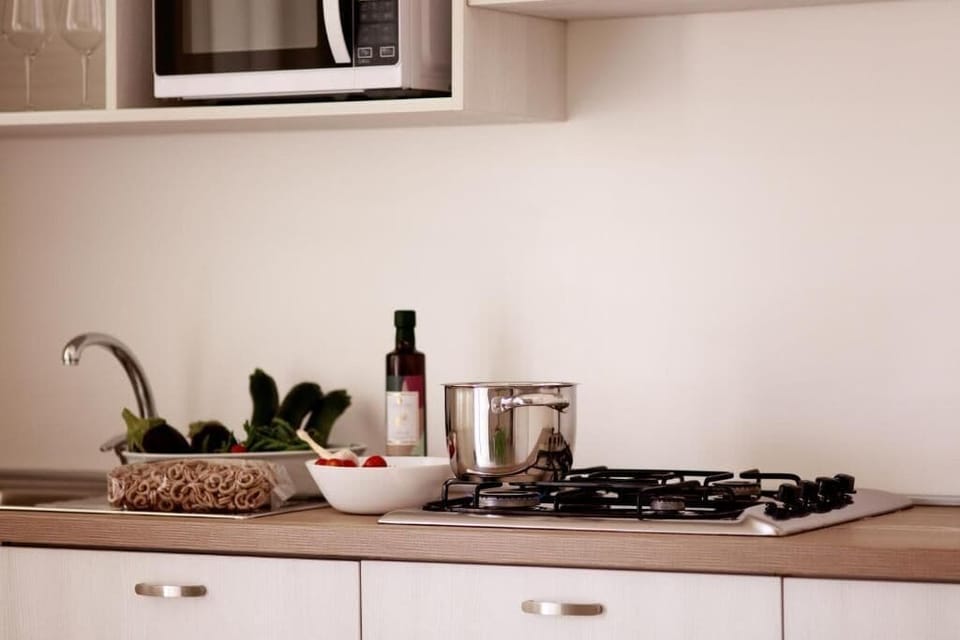 Apartment, Sea View | Premium bedding, minibar, in-room safe, desk