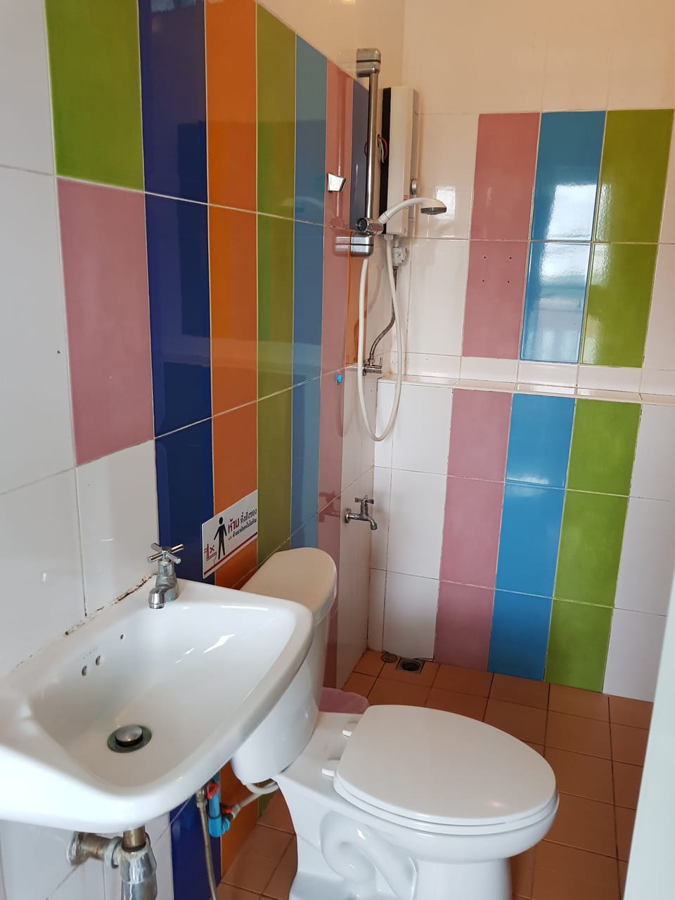 Shower, free toiletries, hair dryer, slippers