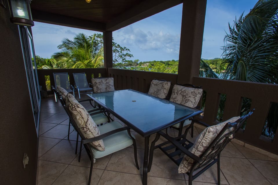Enjoy the covered outdoor patio, seating for 8