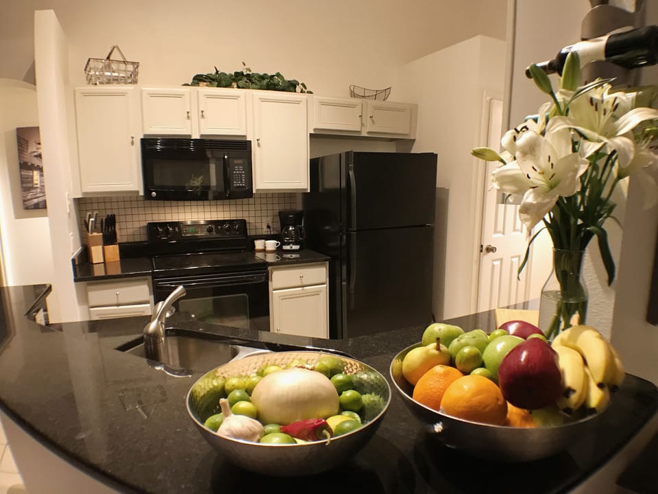 Updated kitchen with granite counter tops.