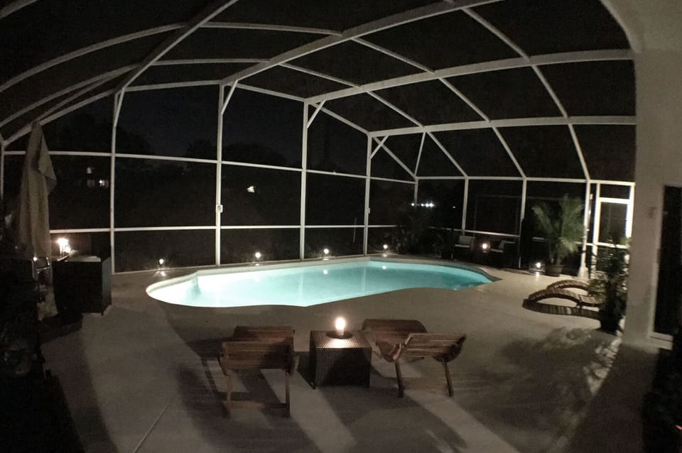 Pool area by night.