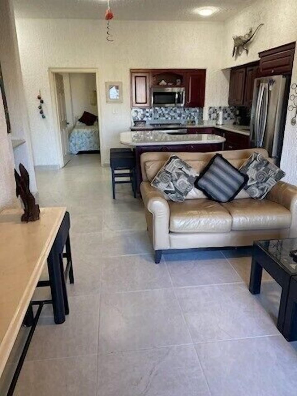 Lovely living space.  Includes sofa and love seat, plus rocker.