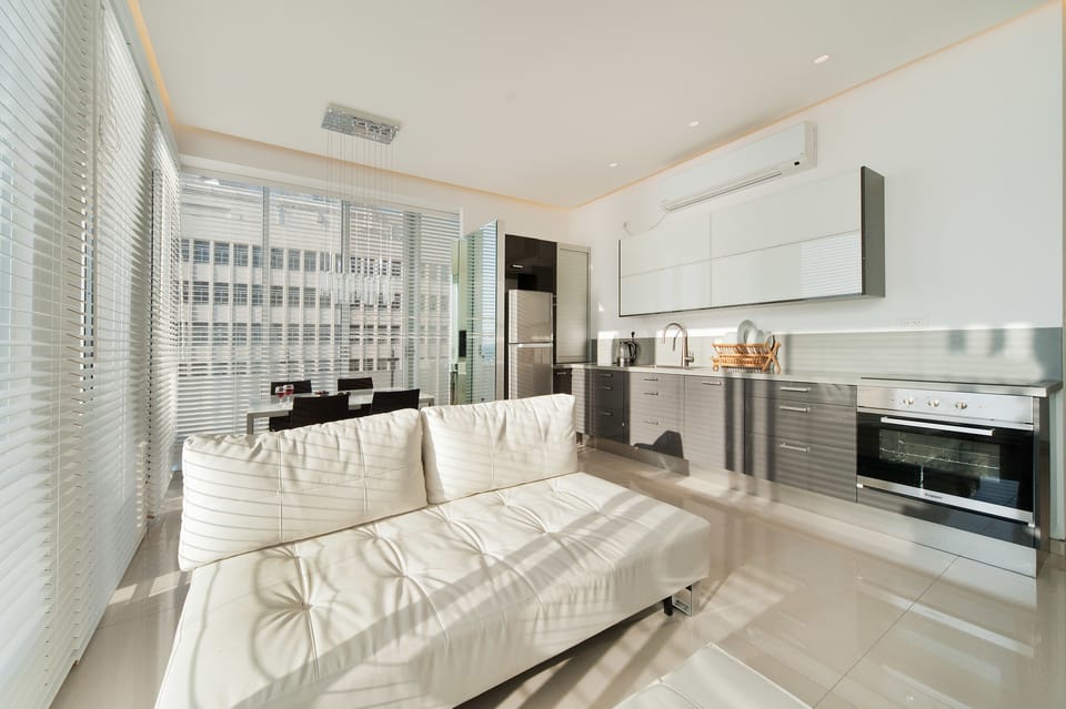 Apartment, 2 Bedrooms, Beach View | Living area | Flat-screen TV