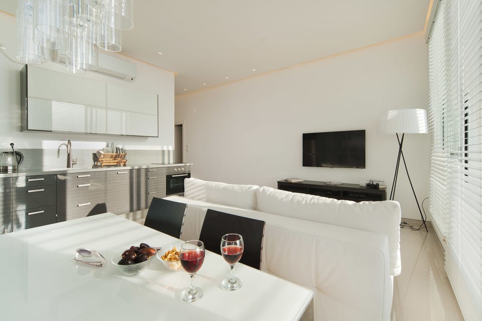 Apartment, 2 Bedrooms, Beach View | Living area | Flat-screen TV