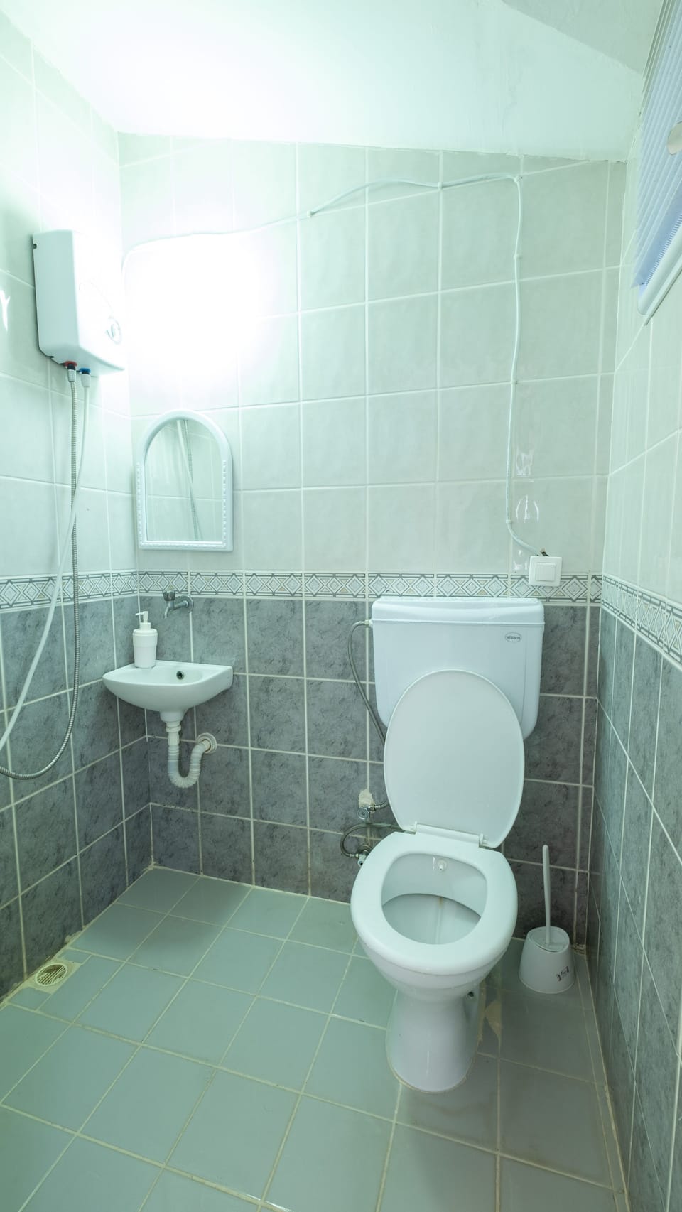 Shower, free toiletries, slippers, towels
