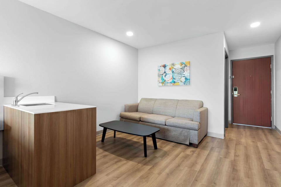 Premium bedding, laptop workspace, blackout drapes, iron/ironing board