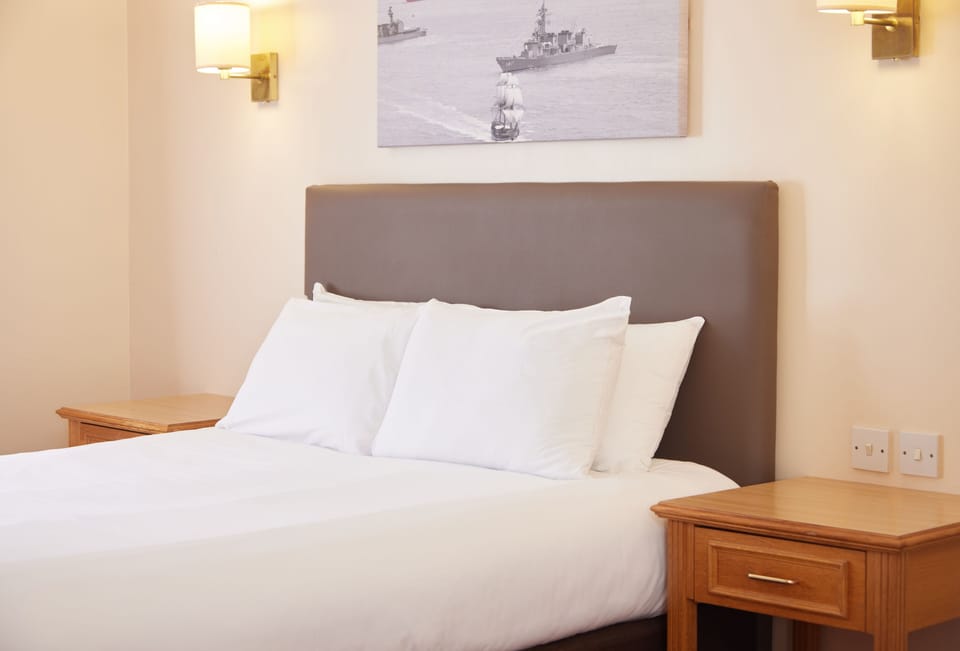 Family Room | Desk, iron/ironing board, free wired internet, bed sheets