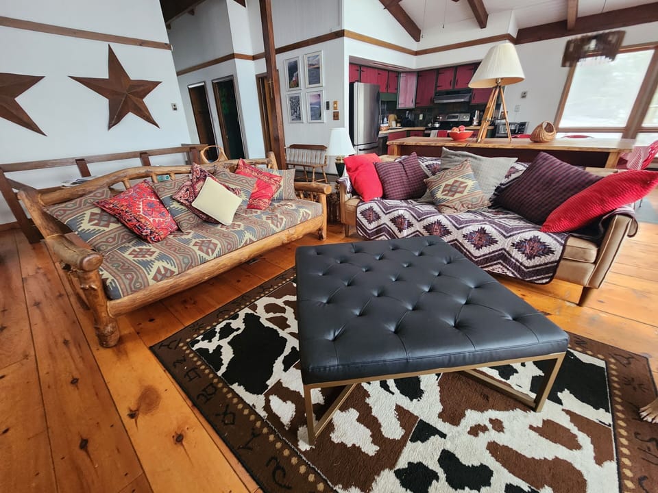 Great room seating area with new ottoman. Rustic country & mid century meet.