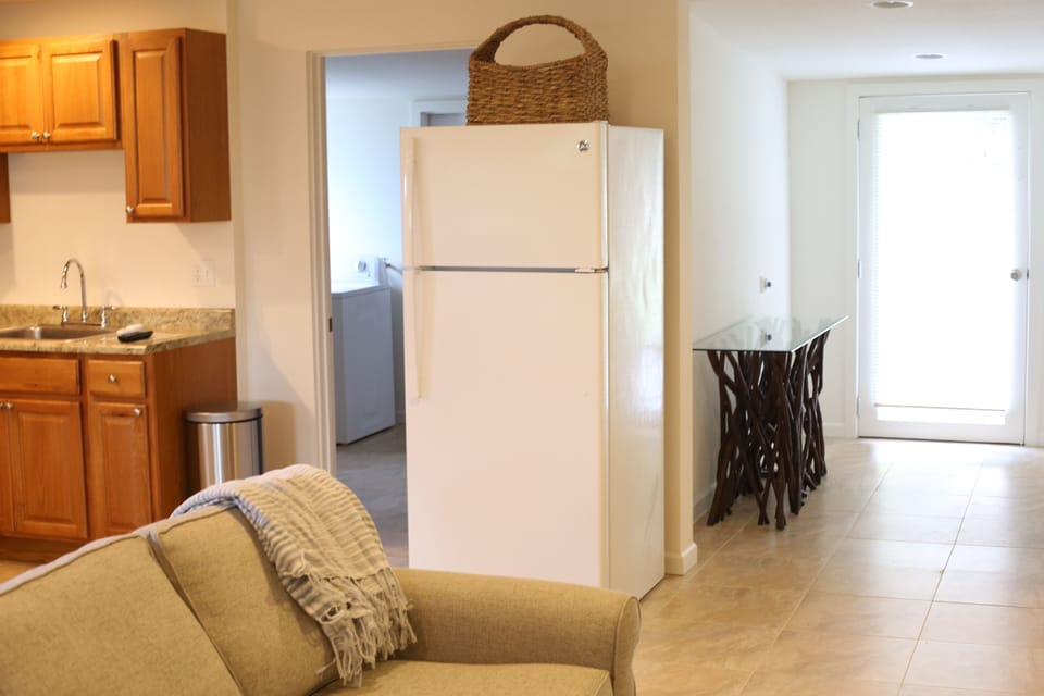 The door on the right leads to the outdoor lanai (patio)

