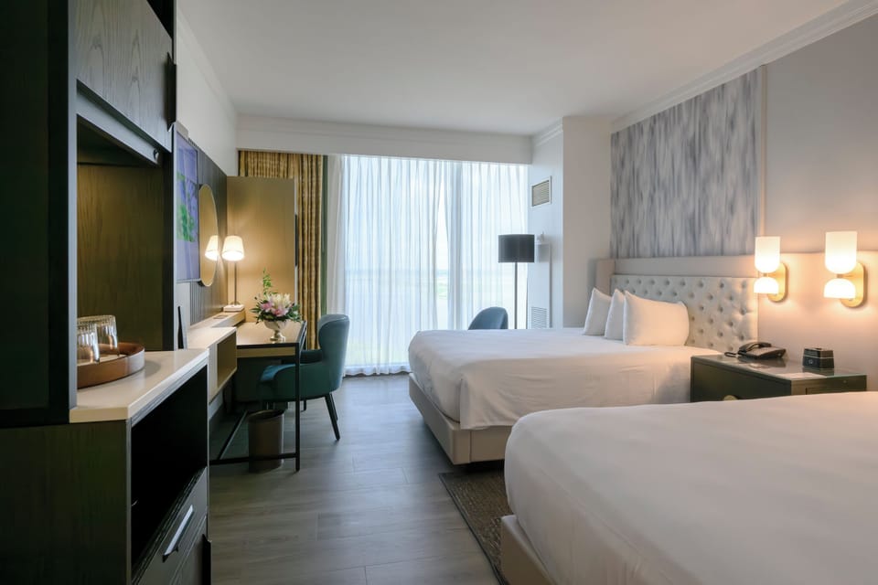 Luxury Two Queen | Pillowtop beds, in-room safe, blackout drapes, iron/ironing board