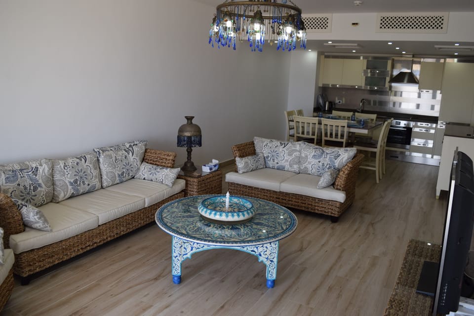 Chalet, Kitchen, Sea View | Living area | 46-inch flat-screen TV with cable channels, TV, table tennis