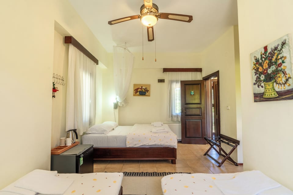 Family Quadruple Room | Hypo-allergenic bedding, desk, iron/ironing board, free WiFi