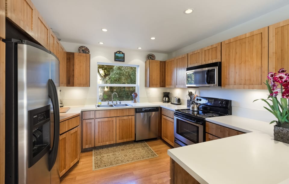 Fabulous gourmet kitchen with all the apportionment's any chef could want.