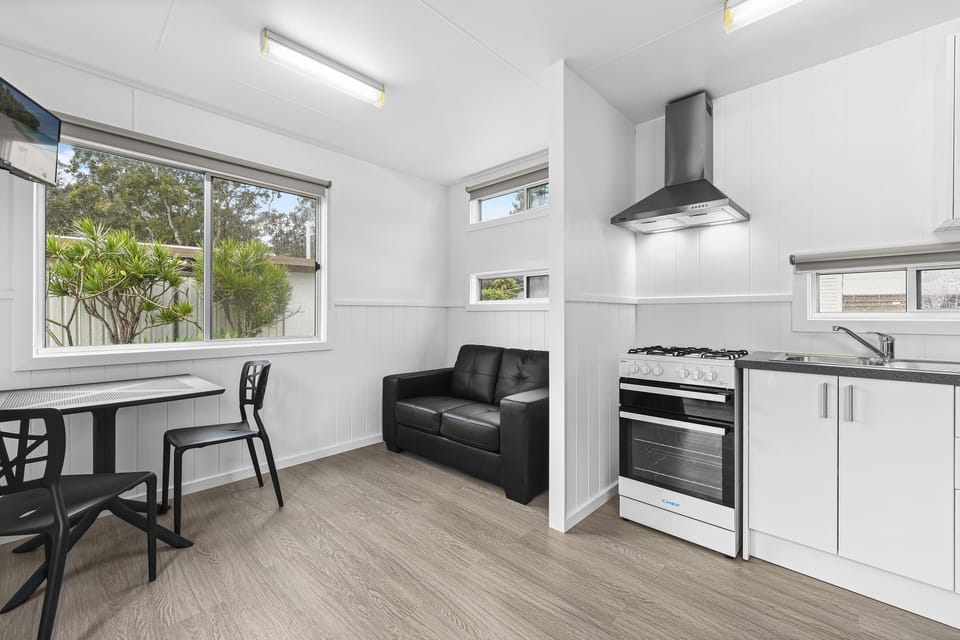 Cabin 11 - No Pets | Living area | Flat-screen TV, DVD player, table tennis