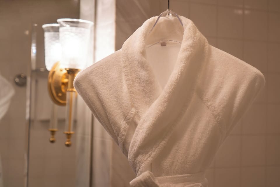 Combined shower/tub, free toiletries, hair dryer, slippers