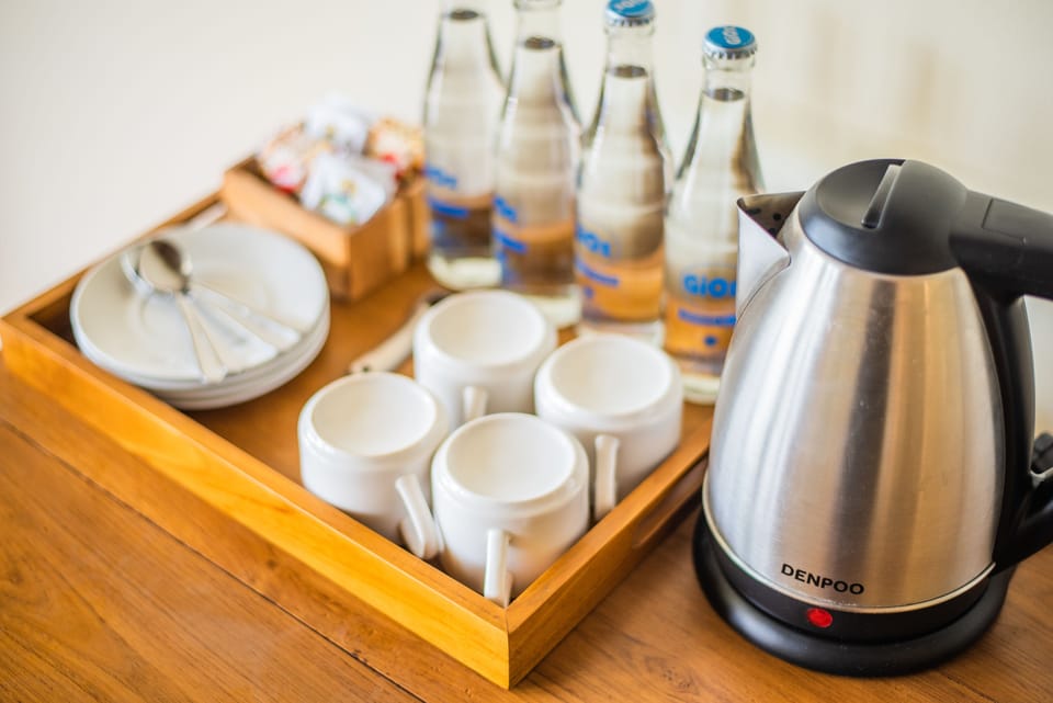 Family Double Room, Balcony | Coffee and/or coffee maker